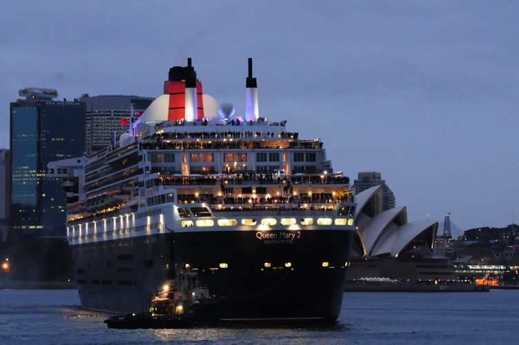 QM2 Sydney Harbour at dawn with Opera House in the back ground