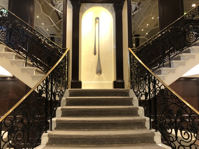 Main staircase on Azamara Pursuit during her launch