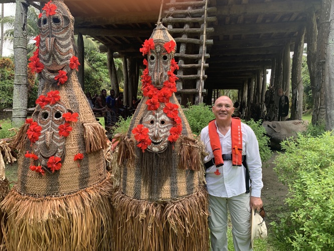 Chambri Tribe traditional dress..that thing around my neck is for the helicopter we flew in and out on!