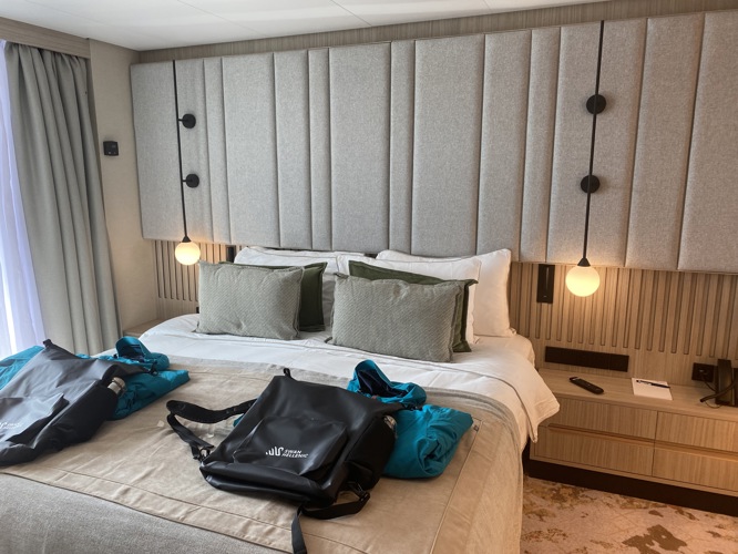 Suite bedroom complete with polar parka's and back packs supplied by Swan Hellenic