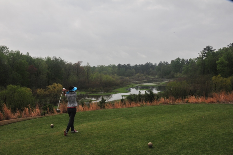 Pip teeing off Champions Retreat