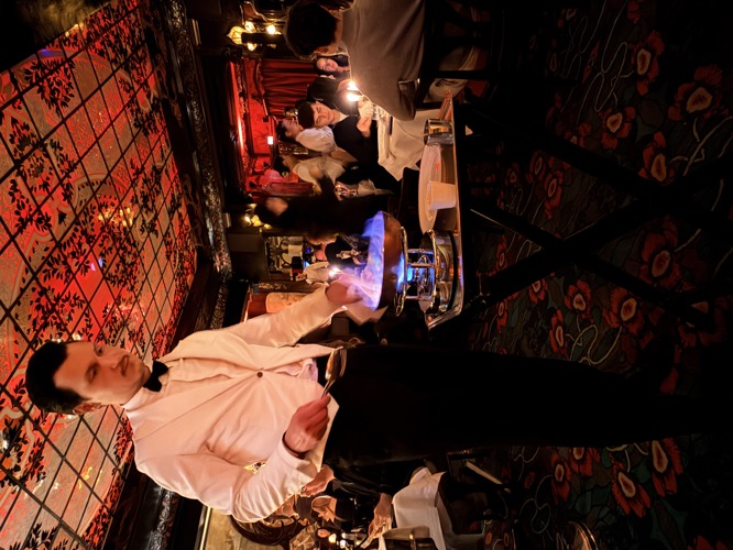 Still cooking at the table at Maxims